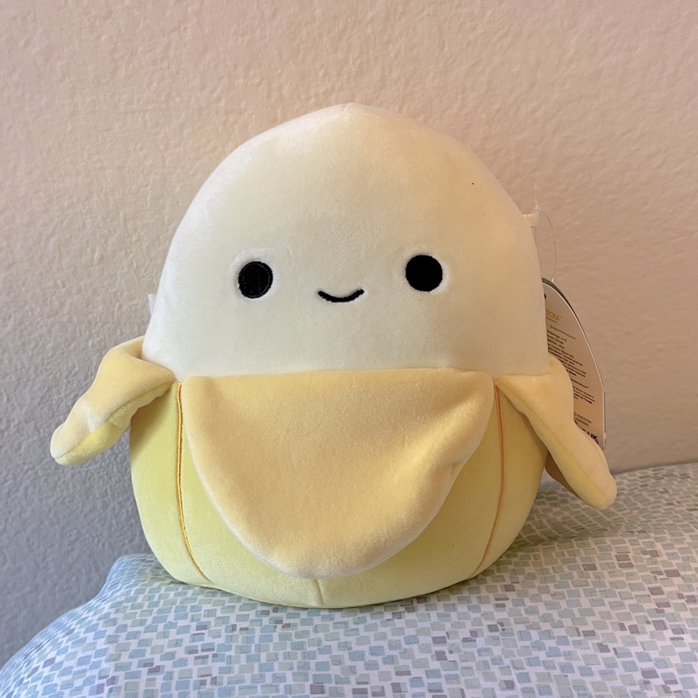Squishmallows Yellow and White Plush Toy